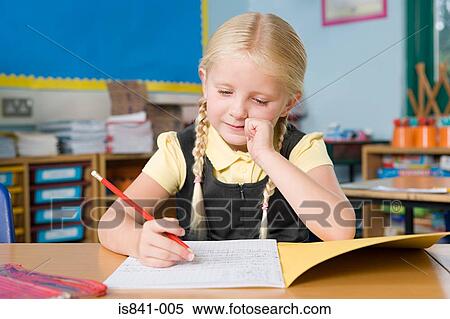 Girl writing in book View Large Photo Image Stock Photography - Girl writing in book. Fotosearch
