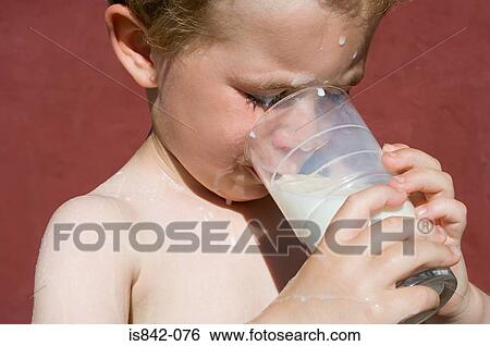 Boy drinking milk View Large Photo Image Stock Photograph - Boy drinking milk. Fotosearch