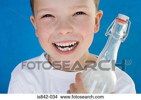 Boy with milk bottle View Large Photo Image Picture - Boy with milk bottle. Fotosearch