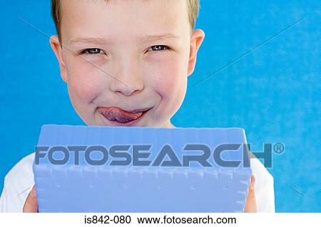 Boy with packed lunch View Large Photo Image Stock Image - Boy with packed lunch. Fotosearch