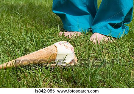 Feet of child and dropped ice cream View Large Photo Image Stock Photography - Feet of child and dropped ice cream. Fotosearch