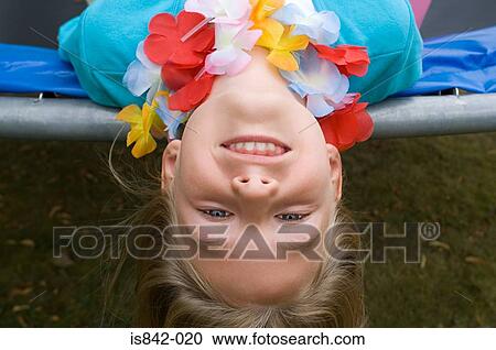 Girl on edge of trampoline View Large Photo Image Stock Image - Girl on edge of trampoline. Fotosearch