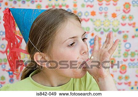 Girl sucking dessert off her hand View Large Photo Image Stock Photo - Girl sucking dessert off her hand. Fotosearch