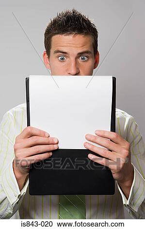 Businessman looking shocked View Large Photo Image Stock Image - Businessman looking shocked. Fotosearch