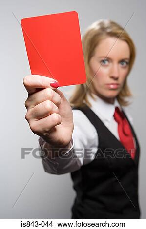 Businesswoman holding red card View Large Photo Image Picture - Businesswoman holding red card. Fotosearch