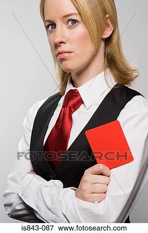 Stock Photo - Businesswoman holding red card. Fotosearch