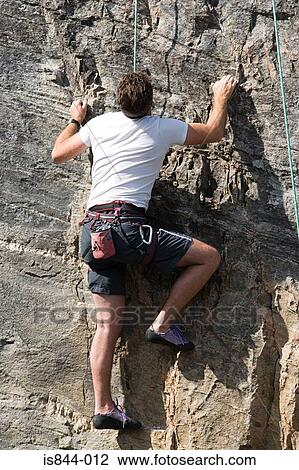 Male rock climber View Large Photo Image Stock Image - Male rock climber. Fotosearch