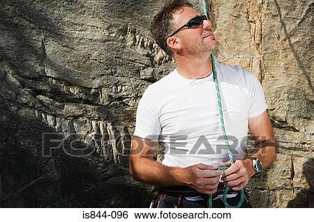 Male rock climber View Large Photo Image Stock Photograph - Male rock climber. Fotosearch