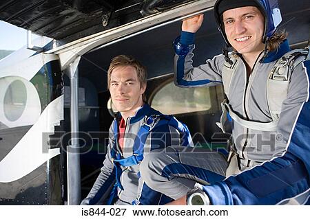 Stock Photo - Two male parachutists. Fotosearch
