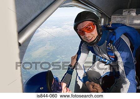 Two parachutists preparing to jump View Large Photo Image Stock Image - Two parachutists preparing to jump. Fotosearch
