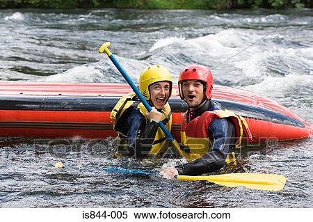Two people white water rafting View Large Photo Image Stock Photography - Two people white water rafting. Fotosearch