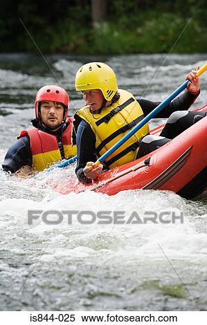 Two people white water rafting View Large Photo Image Stock Photography - Two people white water rafting. Fotosearch