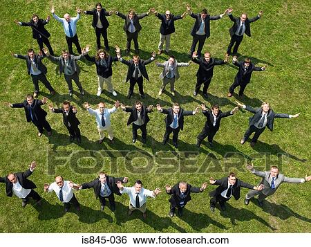 Businessmen with their arms in the air View Large Photo Image Stock Photograph - Businessmen with their arms in the air. Fotosearch