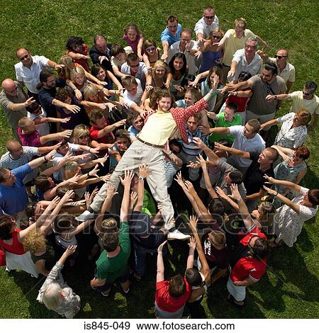 Crowd carrying man View Large Photo Image Stock Photo - Crowd carrying man. Fotosearch