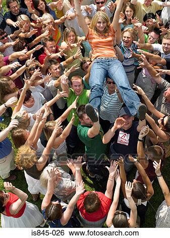 Crowd carrying woman View Large Photo Image Stock Photograph - Crowd carrying woman. Fotosearch