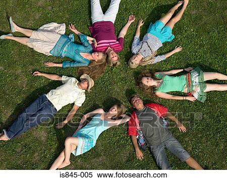 Stock Photography - Frienda asleep in a circle. Fotosearch