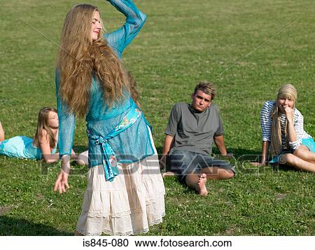People watching woman dancing View Large Photo Image Stock Image - People watching woman dancing. Fotosearch