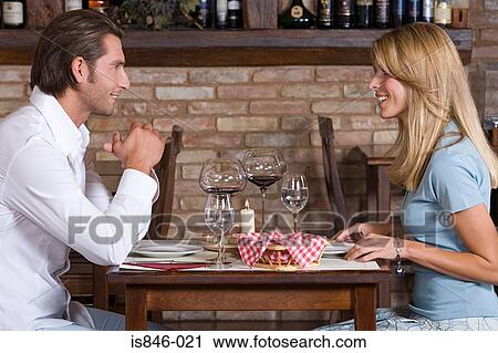 A couple dining View Large Photo Image Stock Image - A couple dining. Fotosearch
