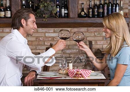 A couple toasting View Large Photo Image Stock Image - A couple toasting. Fotosearch