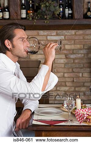 Man drinking red wine View Large Photo Image Stock Image - Man drinking red wine. Fotosearch