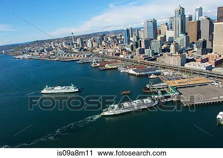 Stock Image - Aerial view of ferries and waterfront, Seattle, Washington State, USA. Fotosearch