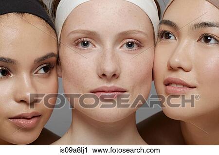 Stock Image - Beauty portrait of three young women. Fotosearch