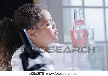 Stock Photo - Girl holding conical flask. Fotosearch
