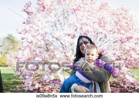 Grandmother and grandchild in garden View Large Photo Image Stock Photo - Grandmother and grandchild in garden. Fotosearch