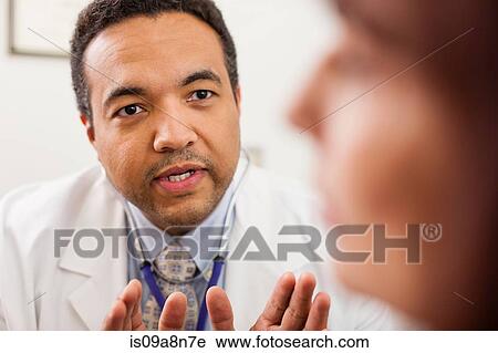 Mature doctor reassuring senior patient, close up View Large Photo Image Stock Image - Mature doctor reassuring senior patient, close up. Fotosearch