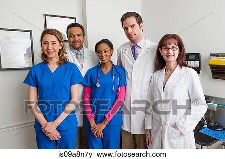 Medical professionals together in hospital, portrait View Large Photo Image Stock Photo - Medical professionals together in hospital, portrait. Fotosearch
