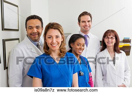 Medical professionals together in hospital, portrait View Large Photo Image Stock Photo - Medical professionals together in hospital, portrait. Fotosearch