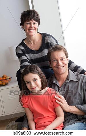 Stock Image - Portrait of girl with parents. Fotosearch
