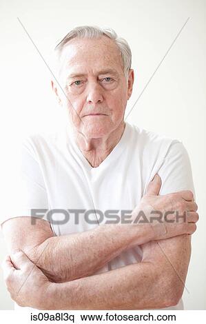 Portrait of senior man wearing white t shirt View Large Photo Image Stock Photography - Portrait of senior man wearing white t shirt. Fotosearch