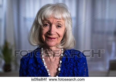 Stock Image - Portrait of senior woman smiling. Fotosearch