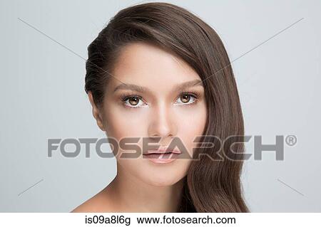 Portrait of woman with brown hair View Large Photo Image Stock Image - Portrait of woman with brown hair. Fotosearch