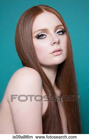 Portrait of woman with long red hair View Large Photo Image Picture - Portrait of woman with long red hair. Fotosearch