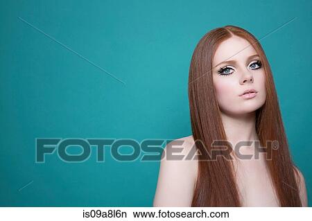 Portrait of woman with long red hair View Large Photo Image Picture - Portrait of woman with long red hair. Fotosearch