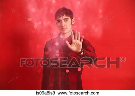 Portrait of young man wearing checked shirt View Large Photo Image Stock Photo - Portrait of young man wearing checked shirt. Fotosearch