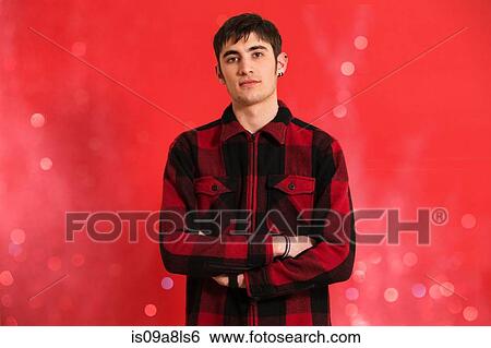 Portrait of young man wearing checked shirt View Large Photo Image Stock Photograph - Portrait of young man wearing checked shirt. Fotosearch