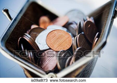 Purse filled with coins View Large Photo Image Stock Image - Purse filled with coins. Fotosearch