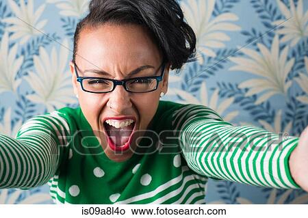 Retro style portrait of woman with arms open View Large Photo Image Picture - Retro style portrait of woman with arms open. Fotosearch
