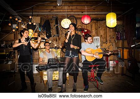 Stock Image - Rock band practising. Fotosearch