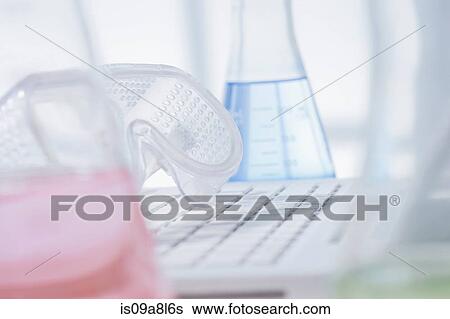 Safety goggles, keyboard and conical flask View Large Photo Image Stock Photograph - Safety goggles, keyboard and conical flask. Fotosearch