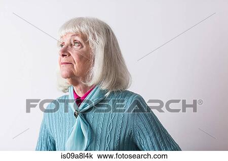 Senior woman with grey hair looking away View Large Photo Image Stock Image - Senior woman with grey hair looking away. Fotosearch
