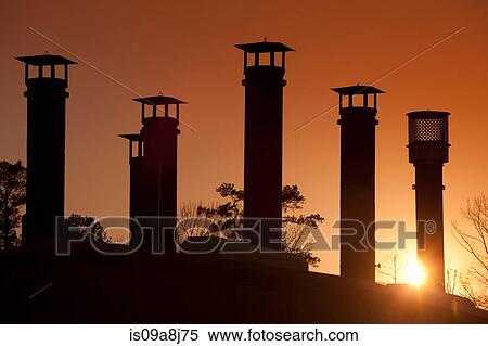 Silhouette of gas pipes in oil refinery at sunset View Large Photo Image Stock Photography - Silhouette of gas pipes in oil refinery at sunset. Fotosearch