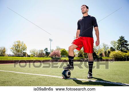 Soccer player preparing for free kick View Large Photo Image Stock Photograph - Soccer player preparing for free kick. Fotosearch