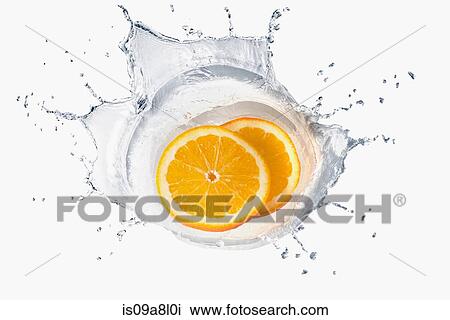 Two slices of orange splashing in liquid View Large Photo Image Stock Image - Two slices of orange splashing in liquid. Fotosearch