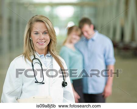 Young doctor with stethoscope smiling, portrait View Large Photo Image Stock Image - Young doctor with stethoscope smiling, portrait. Fotosearch