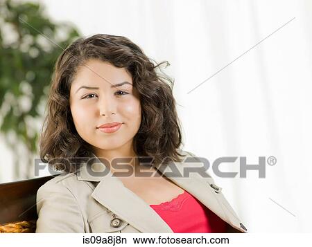 Young woman smiling, portrait View Large Photo Image Picture - Young woman smiling, portrait. Fotosearch