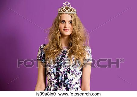 Stock Image - Young woman wearing tiara. Fotosearch